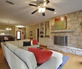 5905-paseo-del-toro-living-with-limestone-fireplace-1